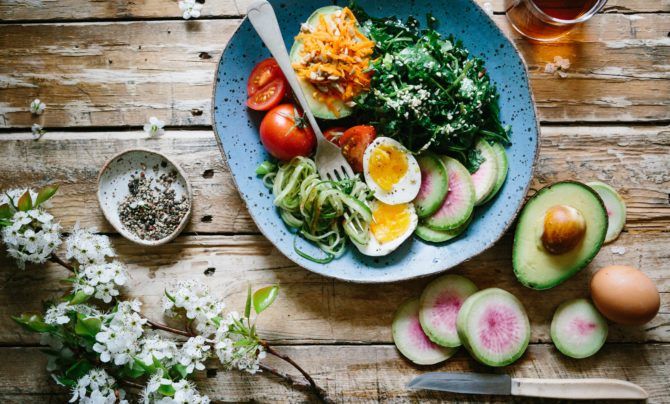 colorful salad bowl with hard boiled eggs